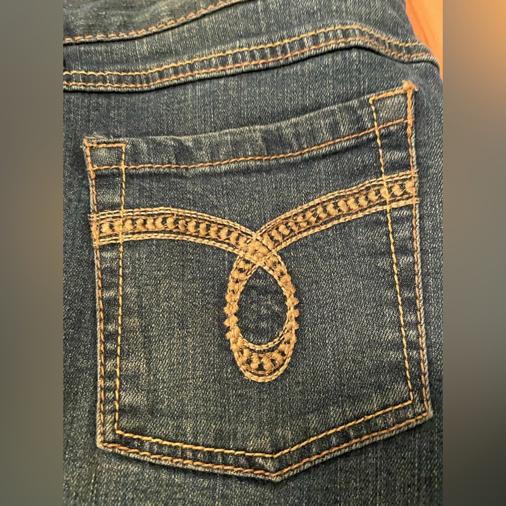 Medium denim straight leg jeans. Never worn.